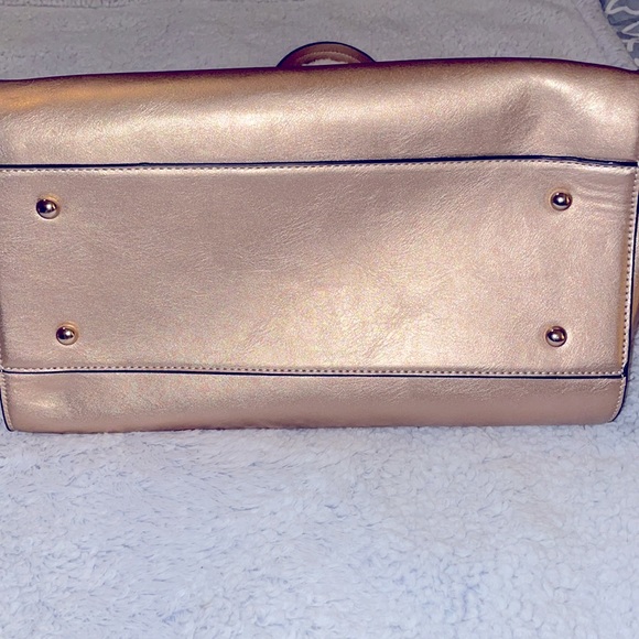 Champagne/Rose Gold tote bag with wristlet and strap to wear as a shoulder bag. - Picture 6 of 6